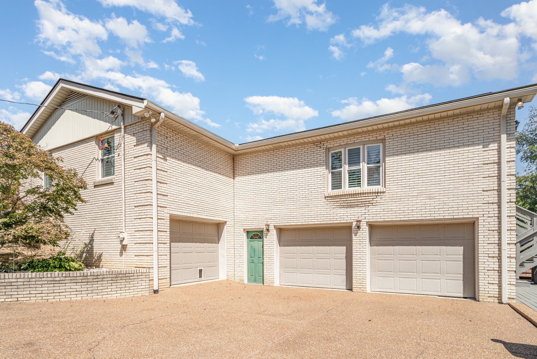 240 Green Harbor Road Old Hickory, TN 37138 - Photo 2 of 30 a front view of a house with a yard and garage