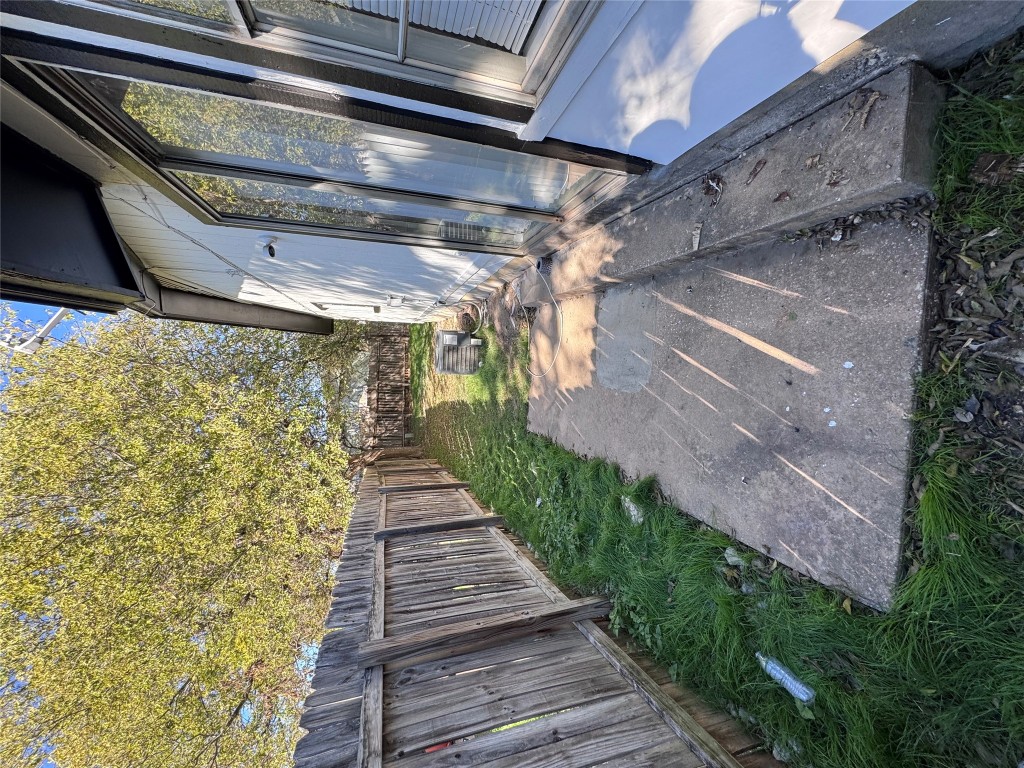5202 Bogey Court, Unit A Austin, TX 78744 - Photo 13 of 15 a view of backyard with outdoor