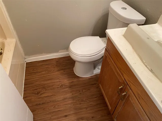 a bathroom with a toilet and a sink