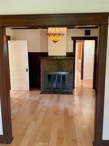 a white toilet sitting next to a bath tub