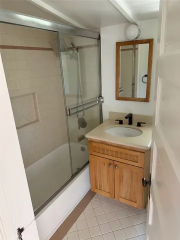 a kitchen with a sink appliances and a window