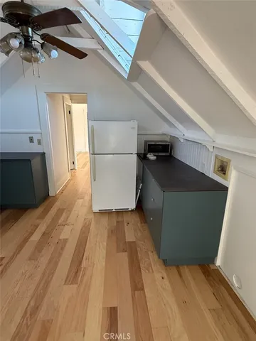 a picture of a bench in a white building