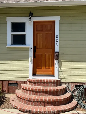 a front view of a house with a window