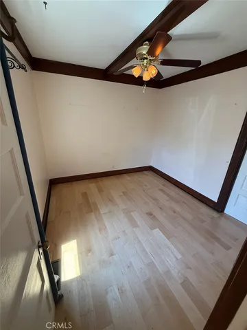 en empty room with window and stairs