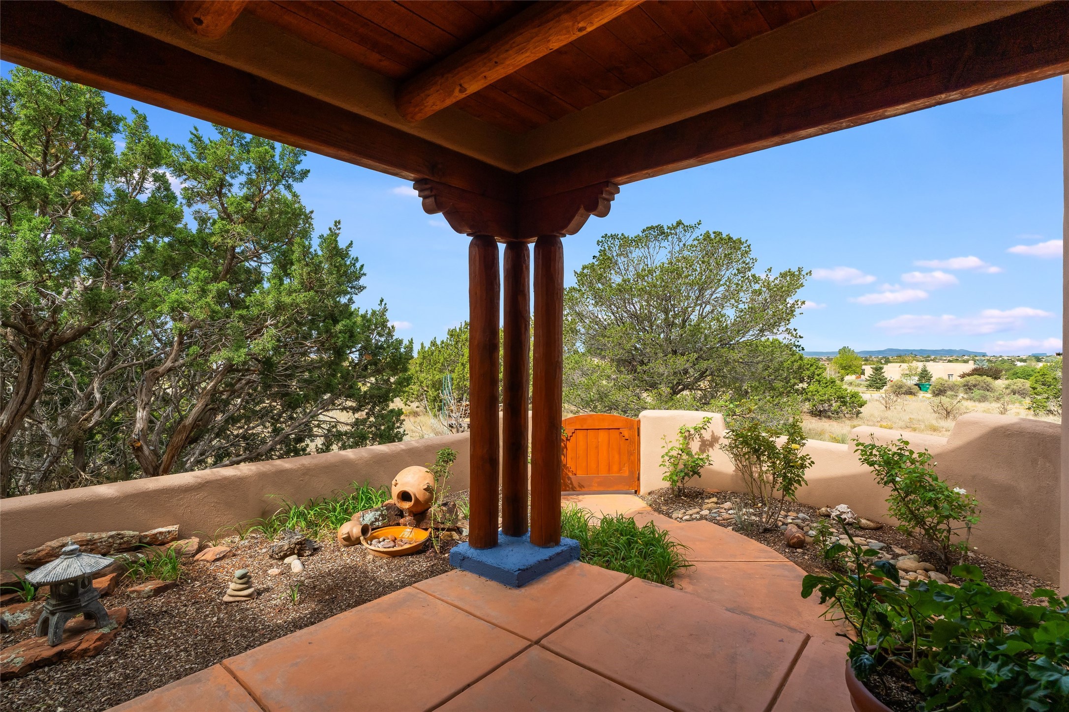 66 Condesa Road Santa Fe, NM 87508 - Photo 24 of 56 Jemez mountains and sunset viewing from family room portal