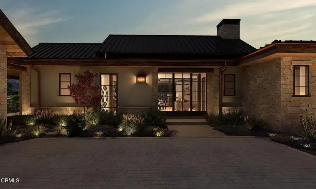 a view of a dining room with furniture wooden floor and chandelier