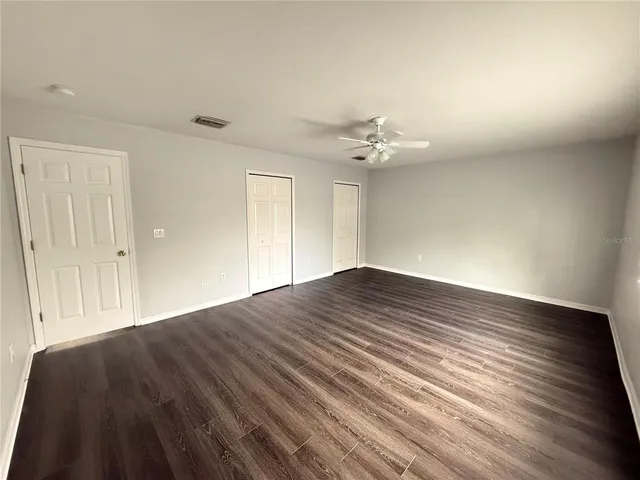 a view of outdoor space with deck and yard