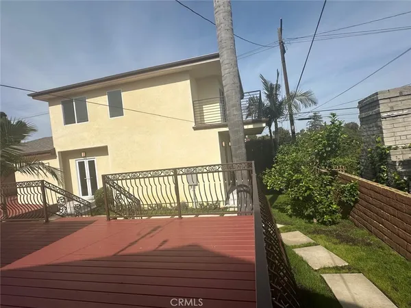 a balcony view with a garden space