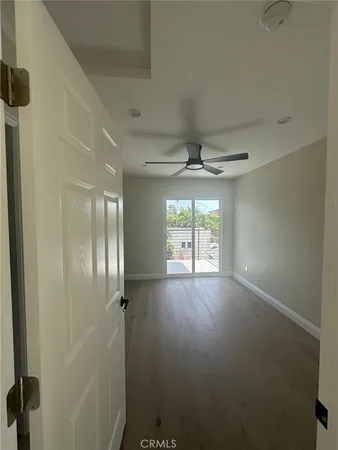 a view of closet area with empty racks