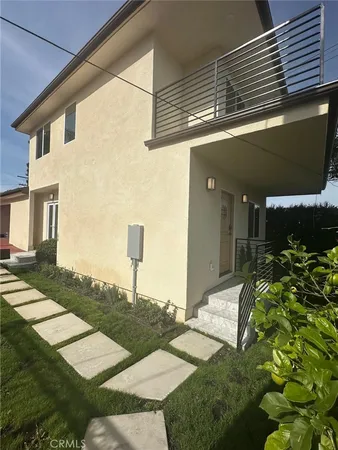 a view of a balcony with an ocean