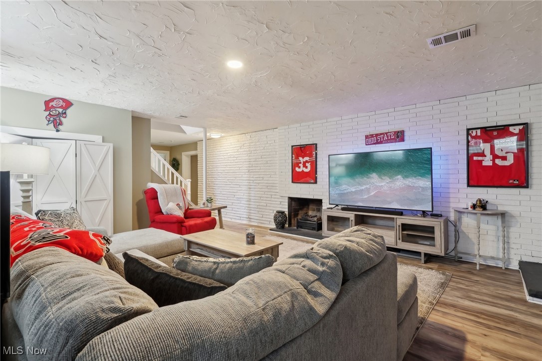 5809 West Ridgewood Drive Cleveland, OH 44129 - Photo 18 of 24 Imagine game day in this wonderful space with wood burning fireplace.