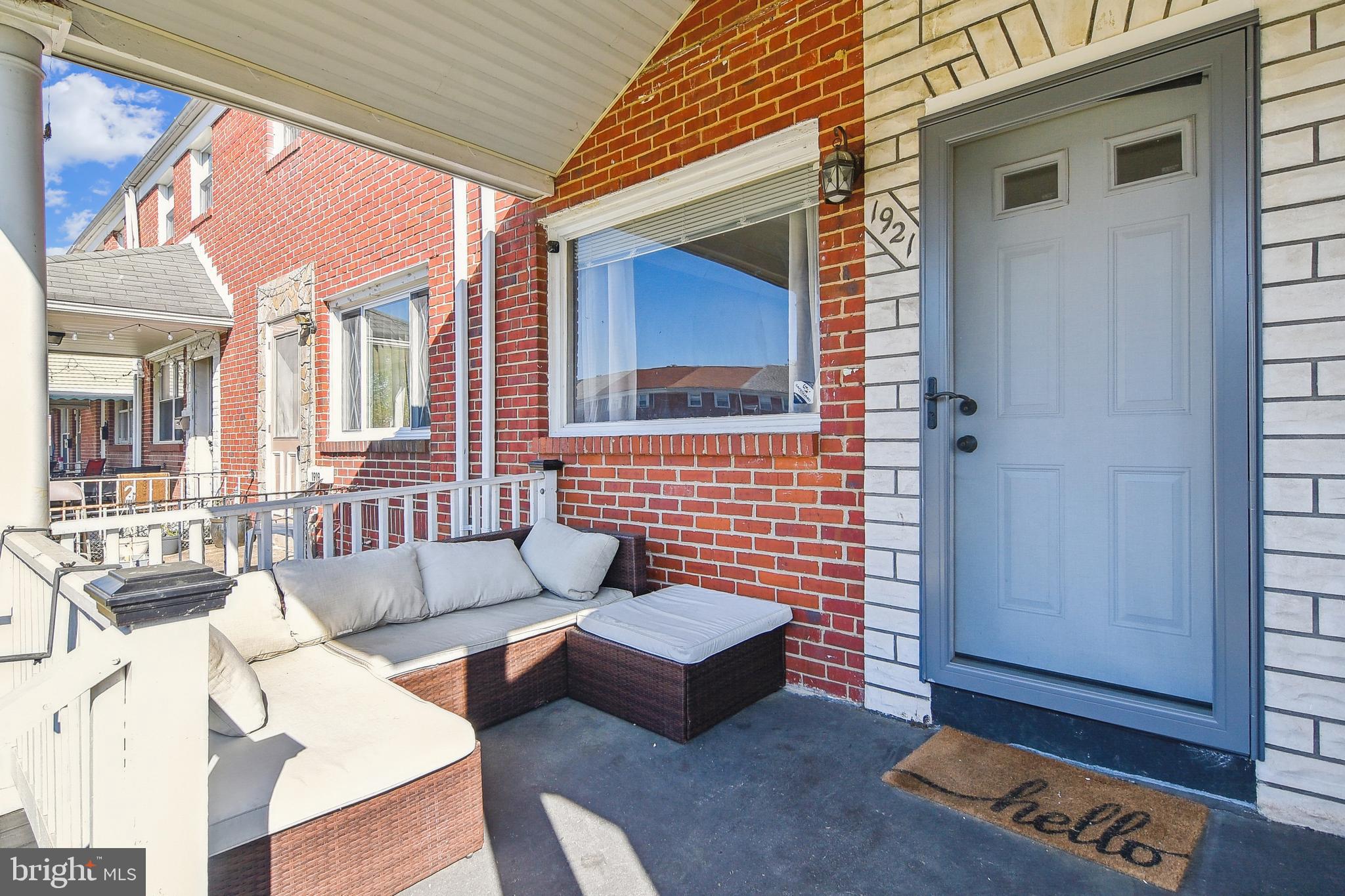 1921 Inverton Road Dundalk, MD 21222 - Photo 4 of 36 a view of a patio with couches and a dining table with outer view