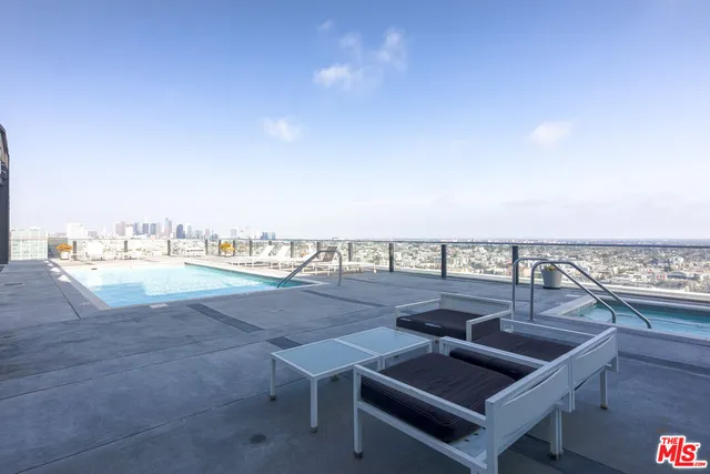 a view of a terrace with seating area