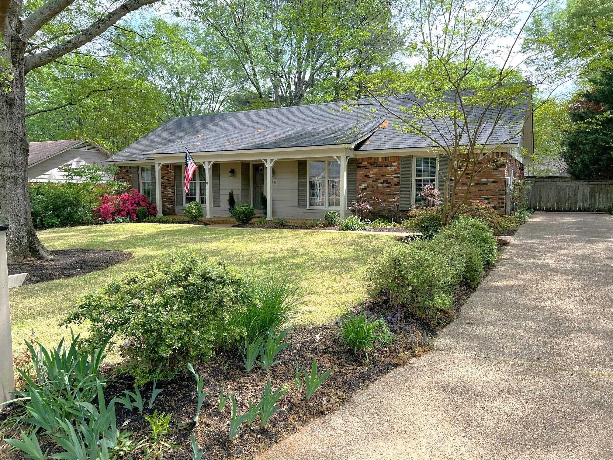 499 Rutledge Cove Collierville, TN 38017 - Photo 18 of 20 a front view of a house with a yard