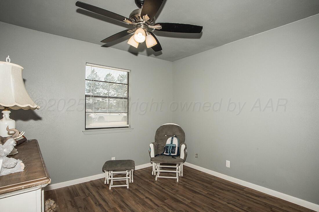 4206 Arden Road Amarillo, TX 79110 - Photo 22 of 26 a workspace with wooden floor