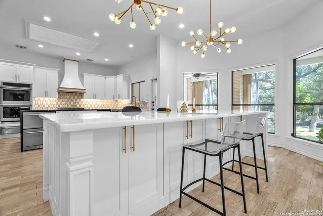 a view of entryway with stairs and wooden floor
