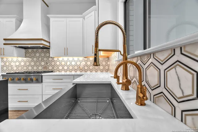 a large bedroom with furniture and large windows