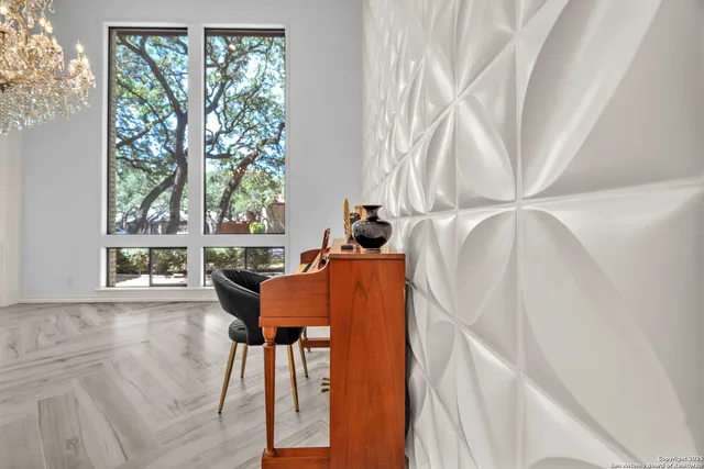 a view of an entryway with wooden floor