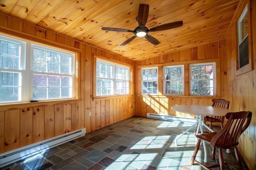 589 Turnpike Road Ashby, MA 01431 - Photo 17 of 40 a view of a lounge chairs in the porch