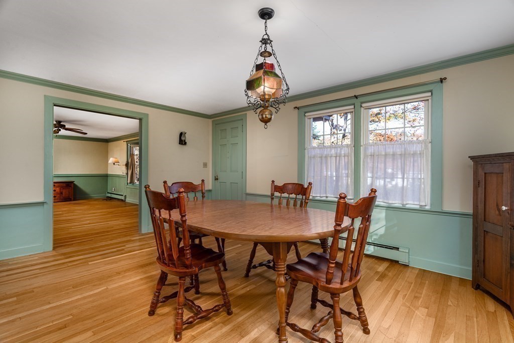 589 Turnpike Road Ashby, MA 01431 - Photo 10 of 40 a view of a dining room with furniture window and wooden floor