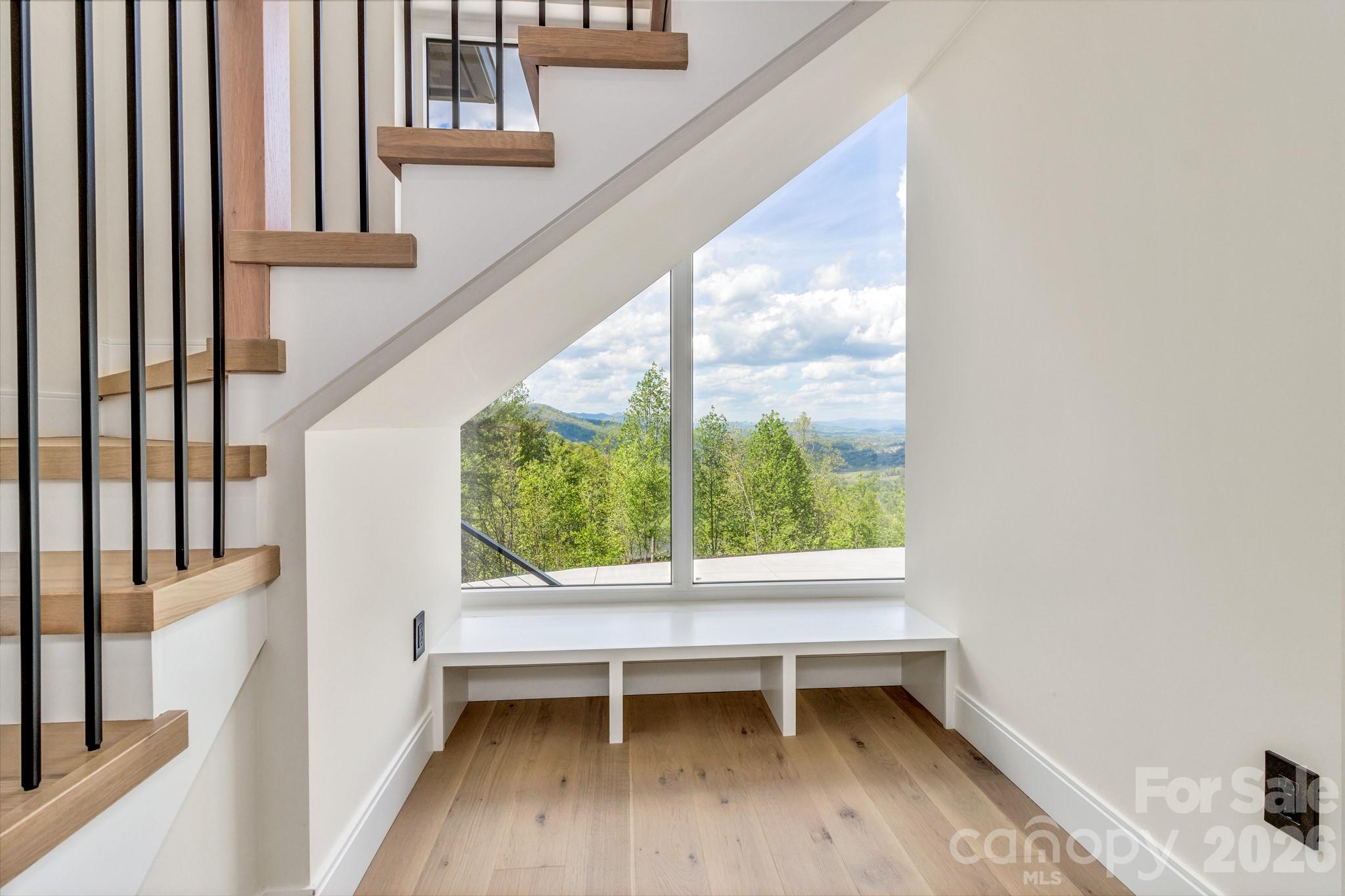 134 View Ridge Parkway Leicester, NC 28748 - Photo 31 of 48 a view of room with window and wooden floor