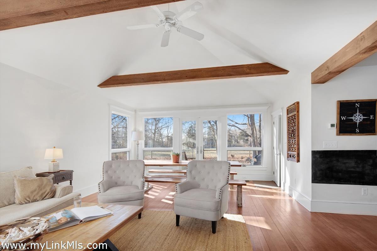 16 S Road Chilmark, MA 02535 - Photo 15 of 30 a living room with furniture and a flat screen tv