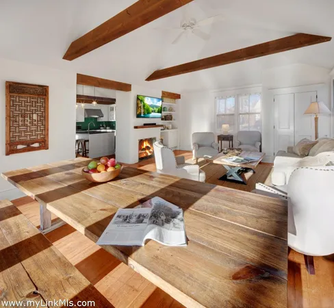 a bed room with a bed and a chair