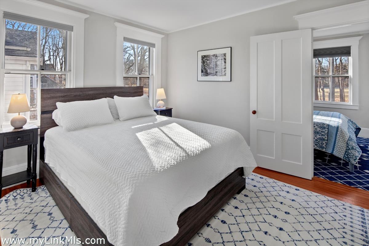 16 S Road Chilmark, MA 02535 - Photo 24 of 30 a bedroom with a bed dresser and a window