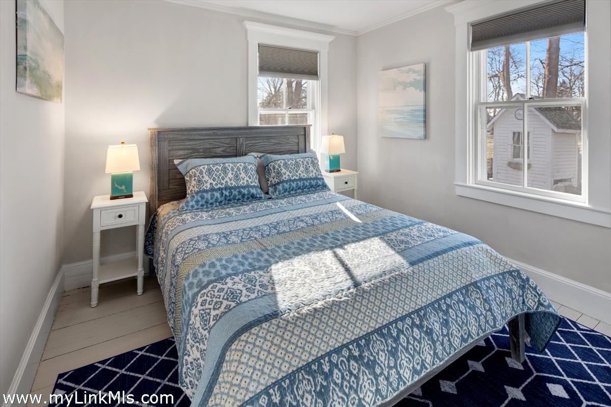 16 S Road Chilmark, MA 02535 - Photo 25 of 30 a bedroom with a bed and windows
