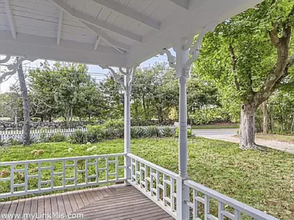 a view of a porch with a yard