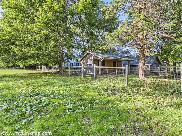 a house view with a garden space