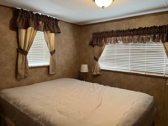 2795 East 28th Road Marseilles, IL 61341 - Photo 13 of 22 a bedroom with a bed and a window