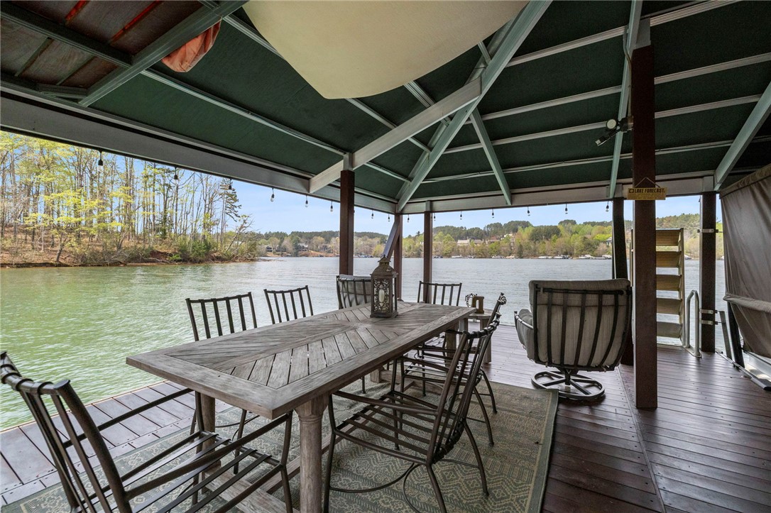 195 Village View Drive Sunset, SC 29685 - Photo 43 of 48 This serene dock offers tranquil lake views, creating a perfect setting for outdoor enjoyment.