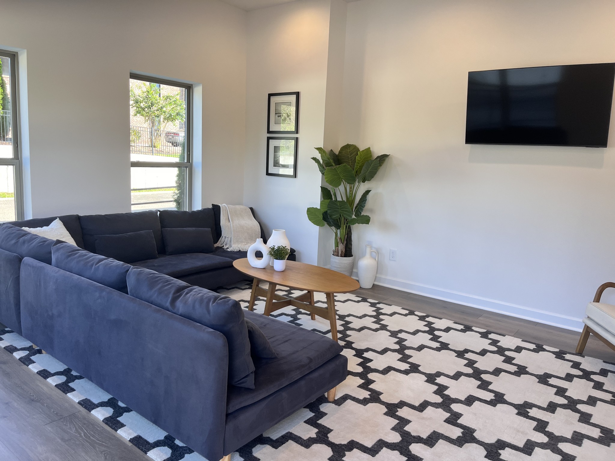 211 A Folsom Pass Spring Hill, Unit A Spring Hill, TN 37174 - Photo 5 of 14 a living room with furniture and a flat screen tv
