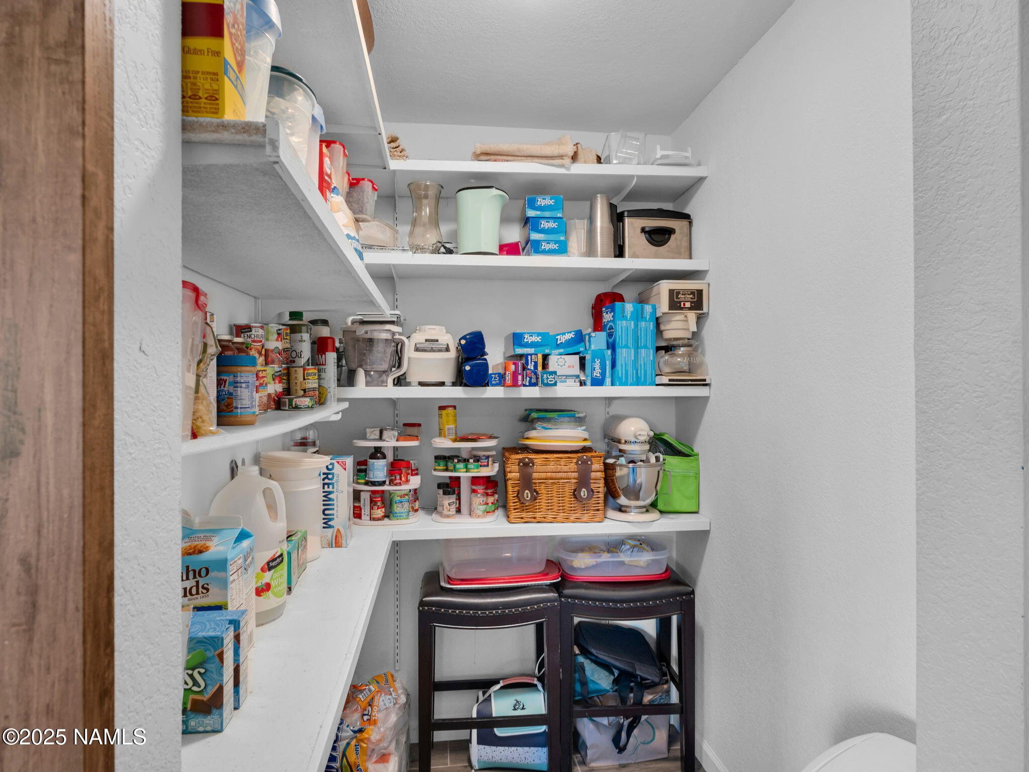 2201 North Fox Hill Road Flagstaff, AZ 86004 - Photo 14 of 38 a utility room with toys and a shelf