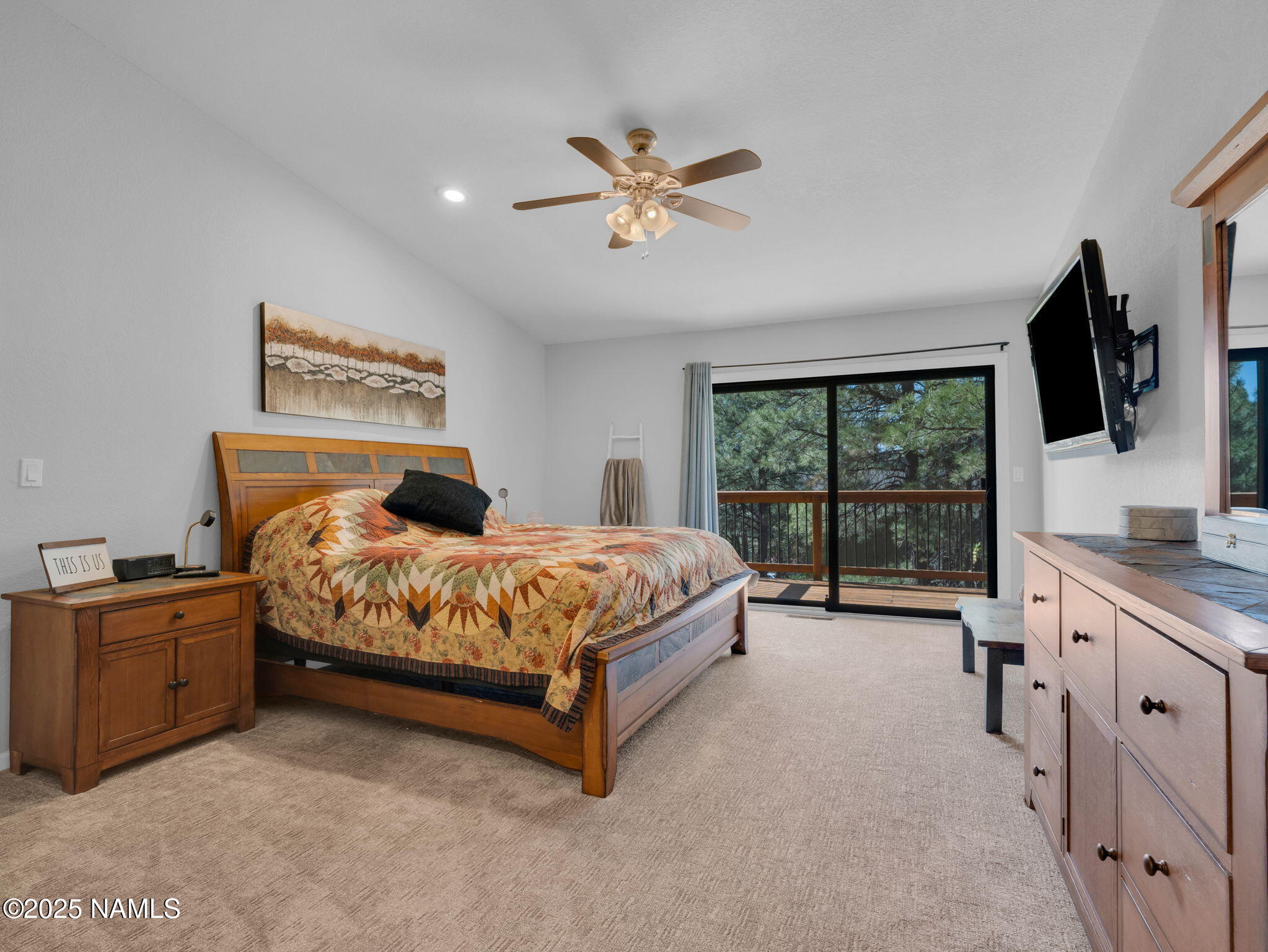 2201 North Fox Hill Road Flagstaff, AZ 86004 - Photo 24 of 38 a bedroom with a large bed and a window