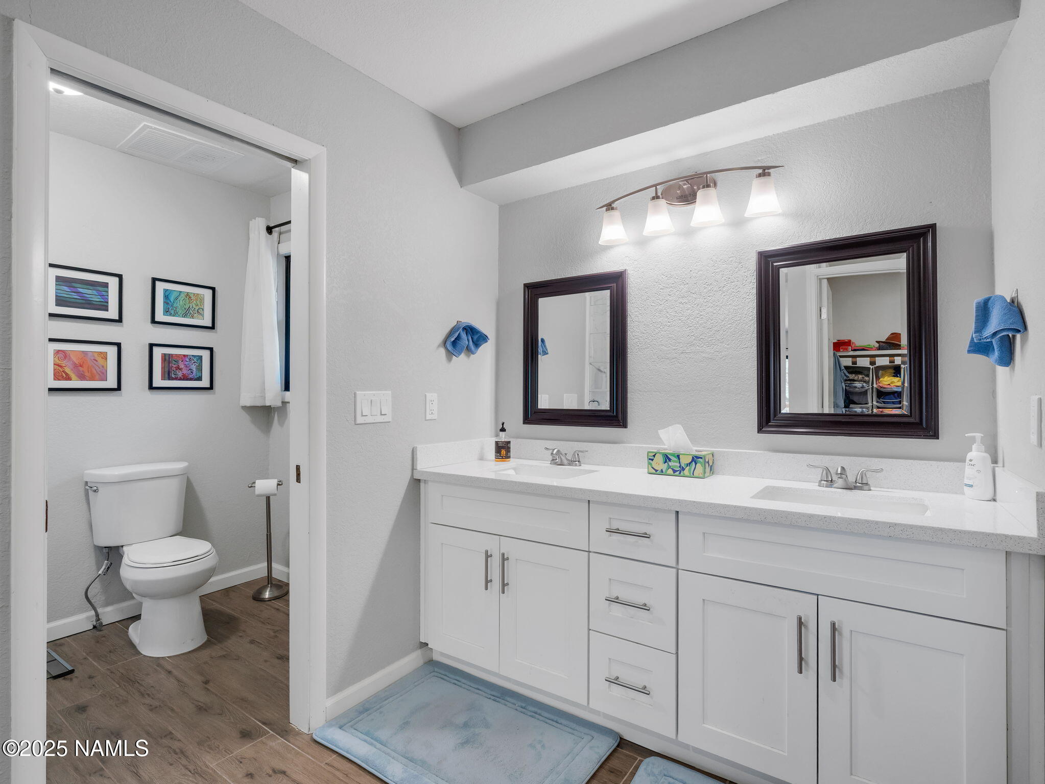 2201 North Fox Hill Road Flagstaff, AZ 86004 - Photo 28 of 38 a bathroom with a toilet sink and mirror