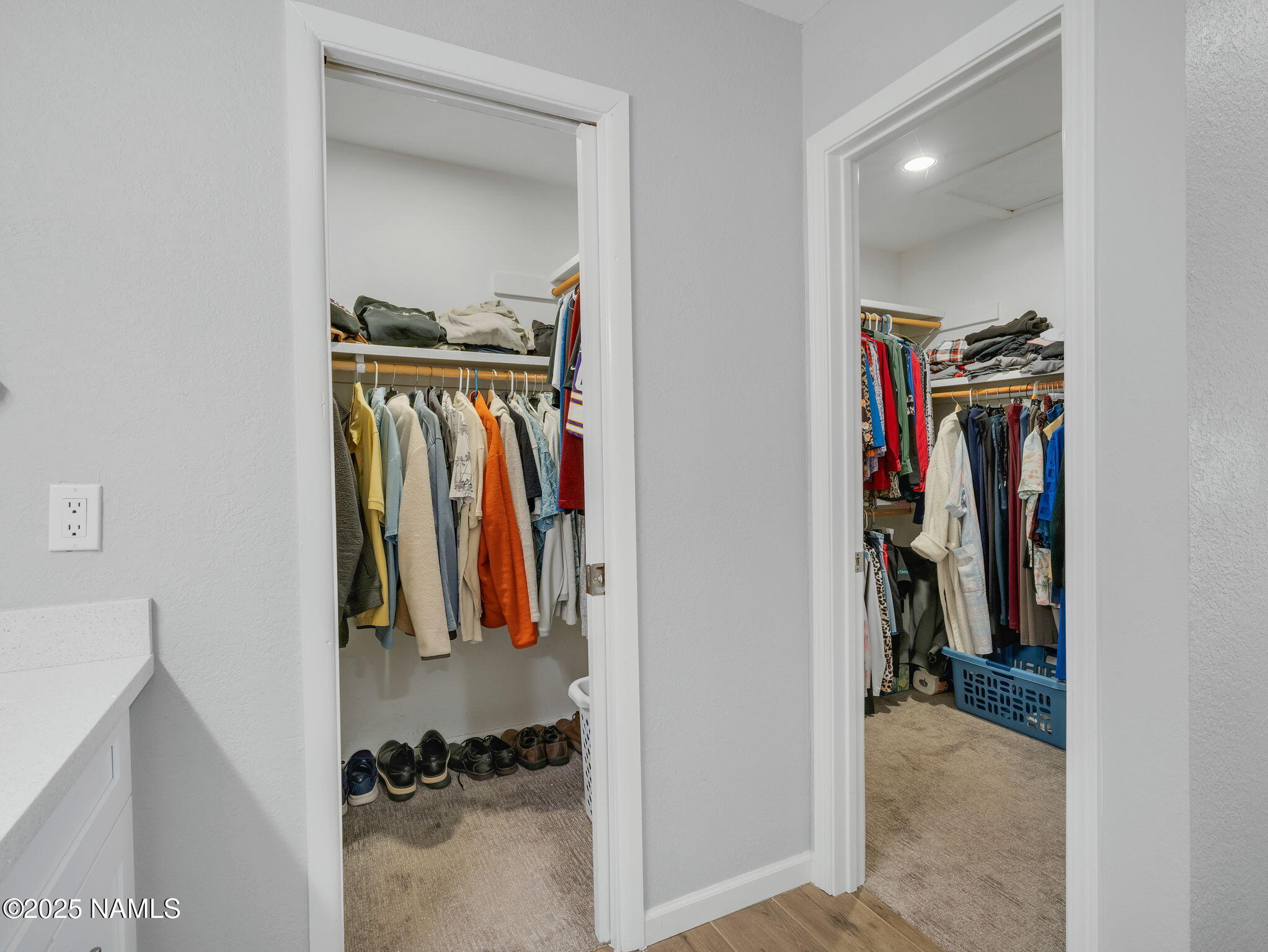 2201 North Fox Hill Road Flagstaff, AZ 86004 - Photo 30 of 38 a view of walk in closet with clothes and shoes