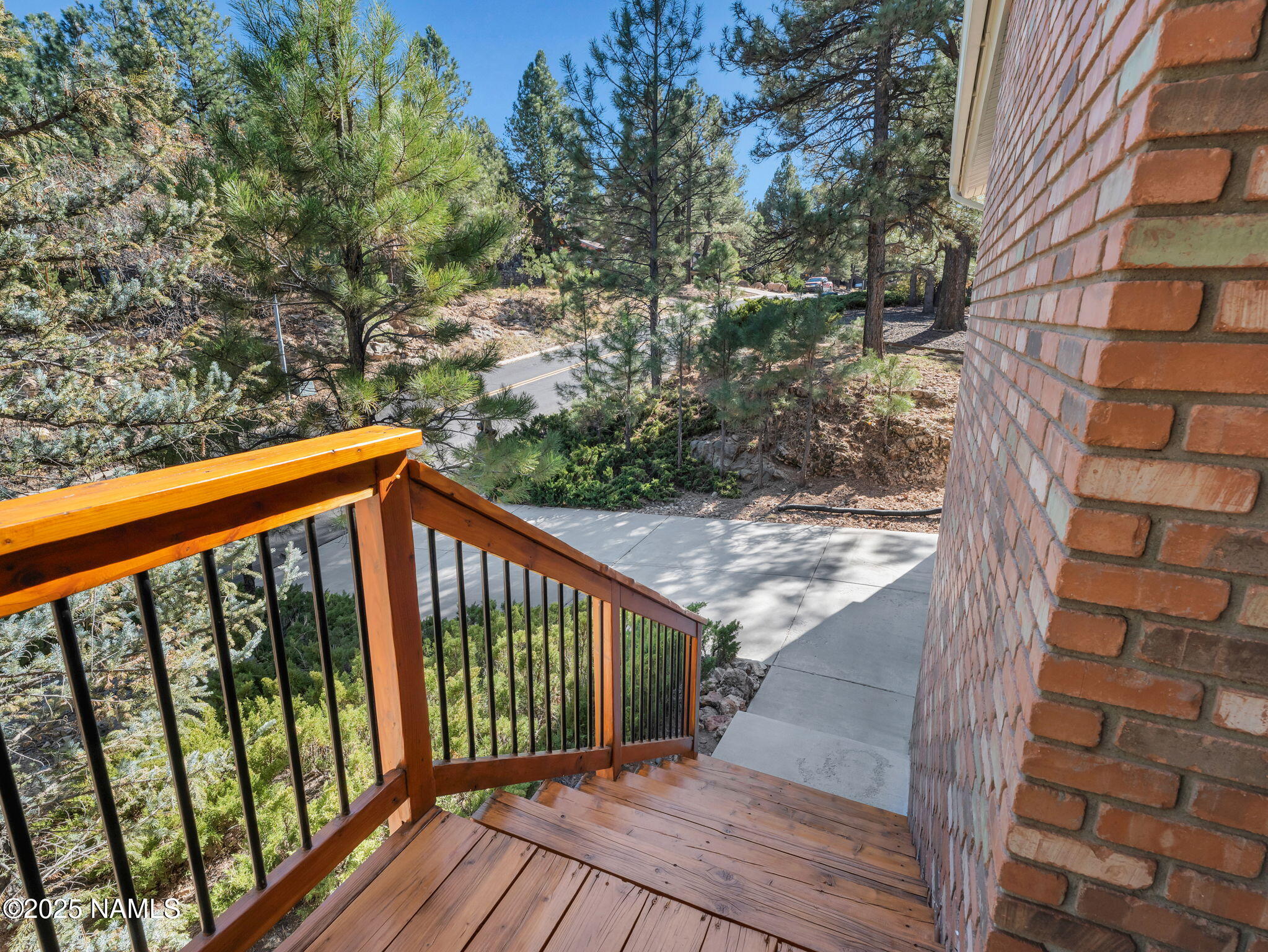 2201 North Fox Hill Road Flagstaff, AZ 86004 - Photo 32 of 38 a balcony with trees in front of it