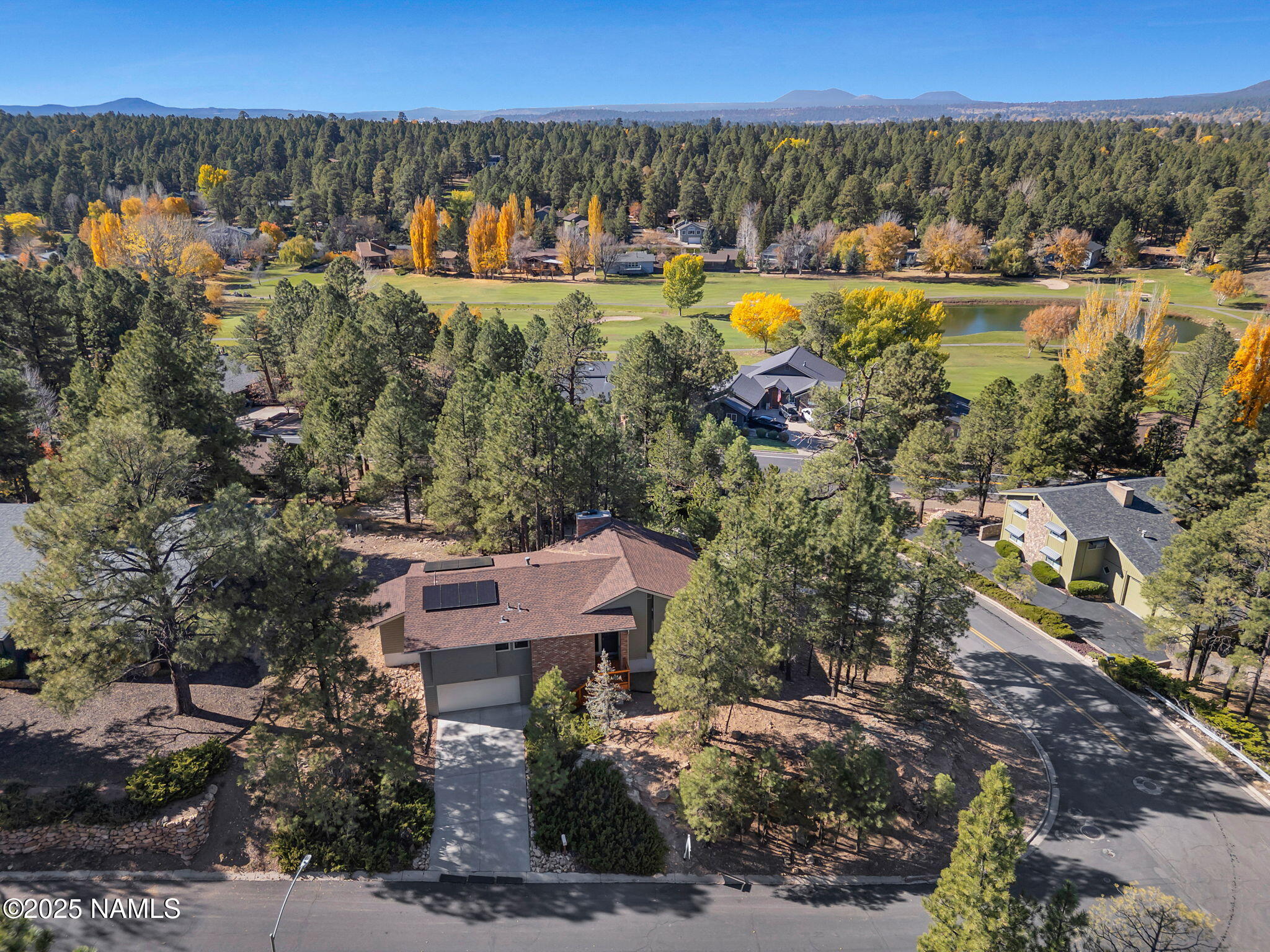 2201 North Fox Hill Road Flagstaff, AZ 86004 - Photo 34 of 38 an aerial view of a house with a swimming pool