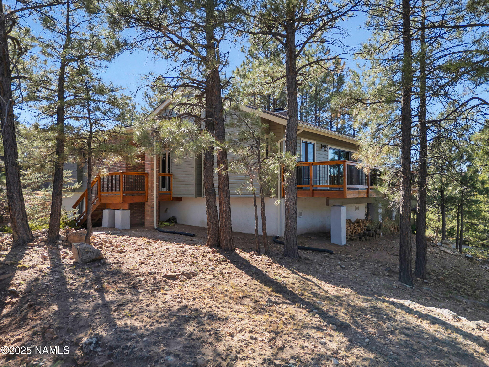 2201 North Fox Hill Road Flagstaff, AZ 86004 - Photo 38 of 38 a front view of a house with a yard