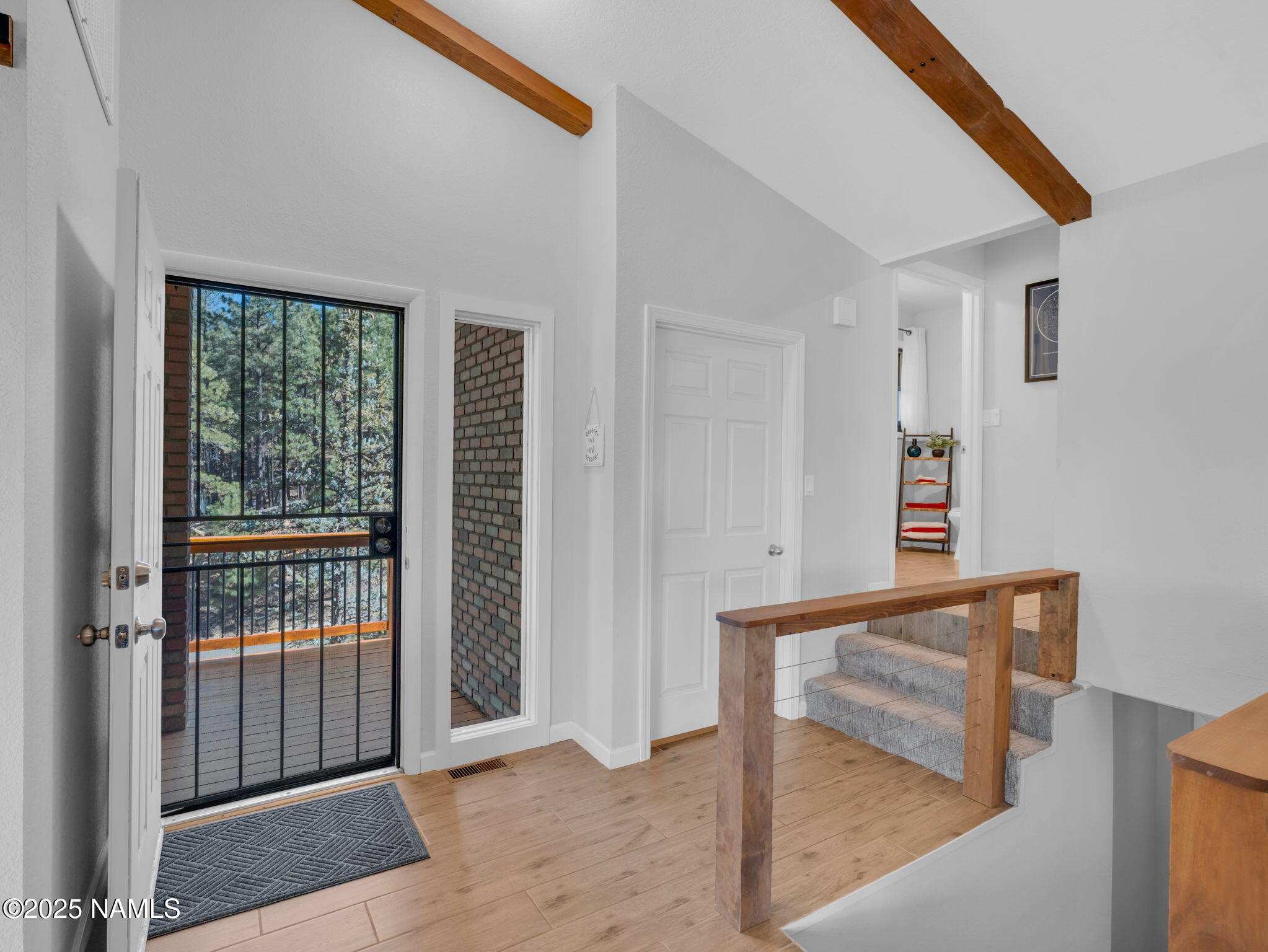 2201 North Fox Hill Road Flagstaff, AZ 86004 - Photo 9 of 38 a view of an entryway with a window