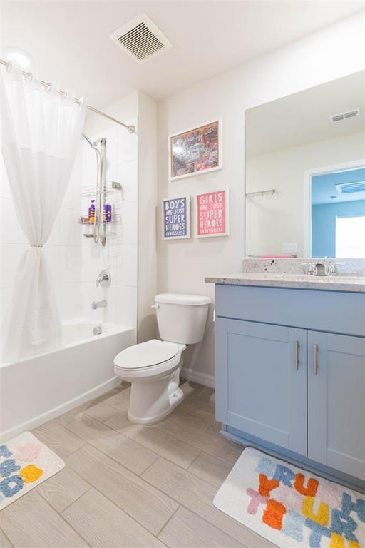 2760 Emory Sound Place Brandon, FL 33510 - Photo 33 of 52 a bathroom with a sink a toilet and shower