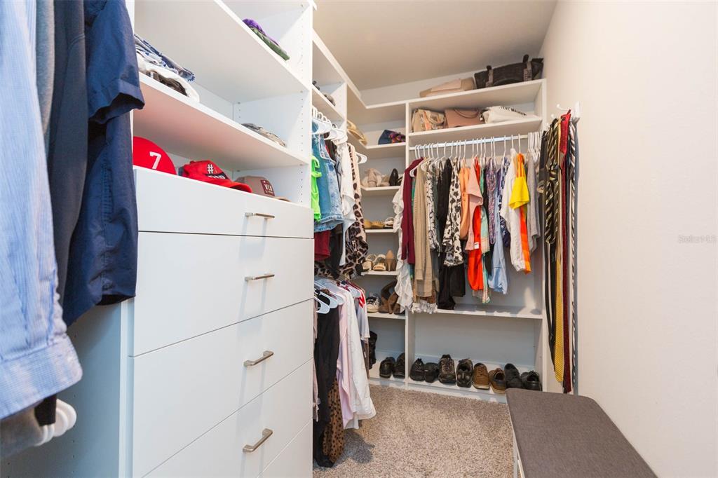 2760 Emory Sound Place Brandon, FL 33510 - Photo 39 of 52 a view of walk in closet with clothes and shoes