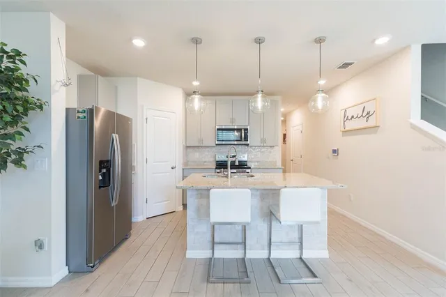 an outdoor space with furniture and umbrella