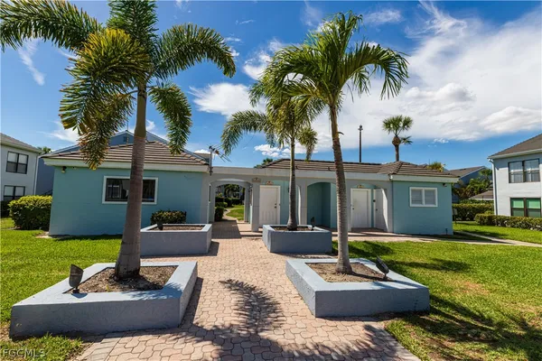 a front view of house with yard