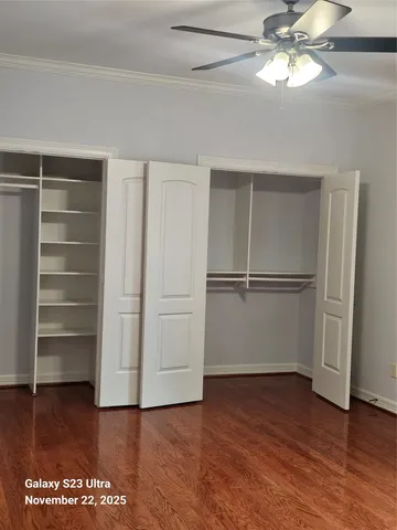 a kitchen with granite countertop a sink and cabinets