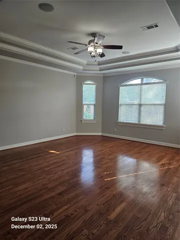 a large bathroom with a granite countertop sink and a mirror