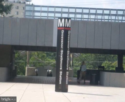 a view of a glass door with a yard