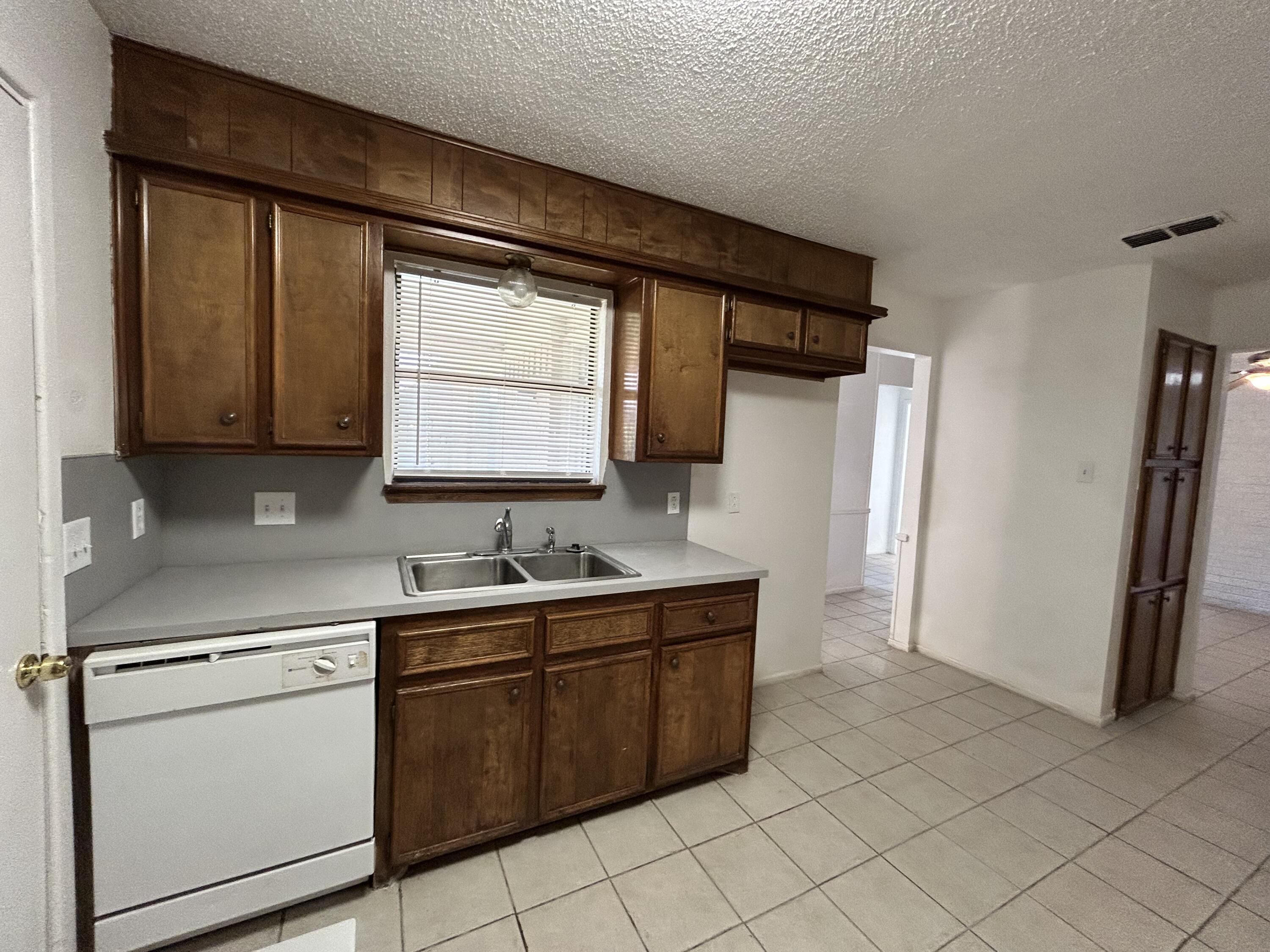 1303 80th Street, Unit A Lubbock, TX 79423 - Photo 3 of 16 IMG_0219